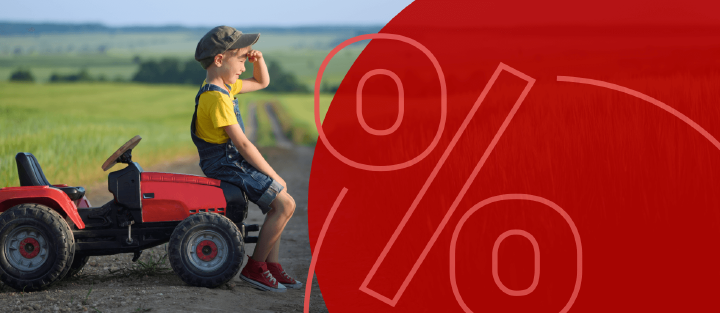 junge kind sitzt auf Trekker trampeltrekker sale prozent preiskracherbild